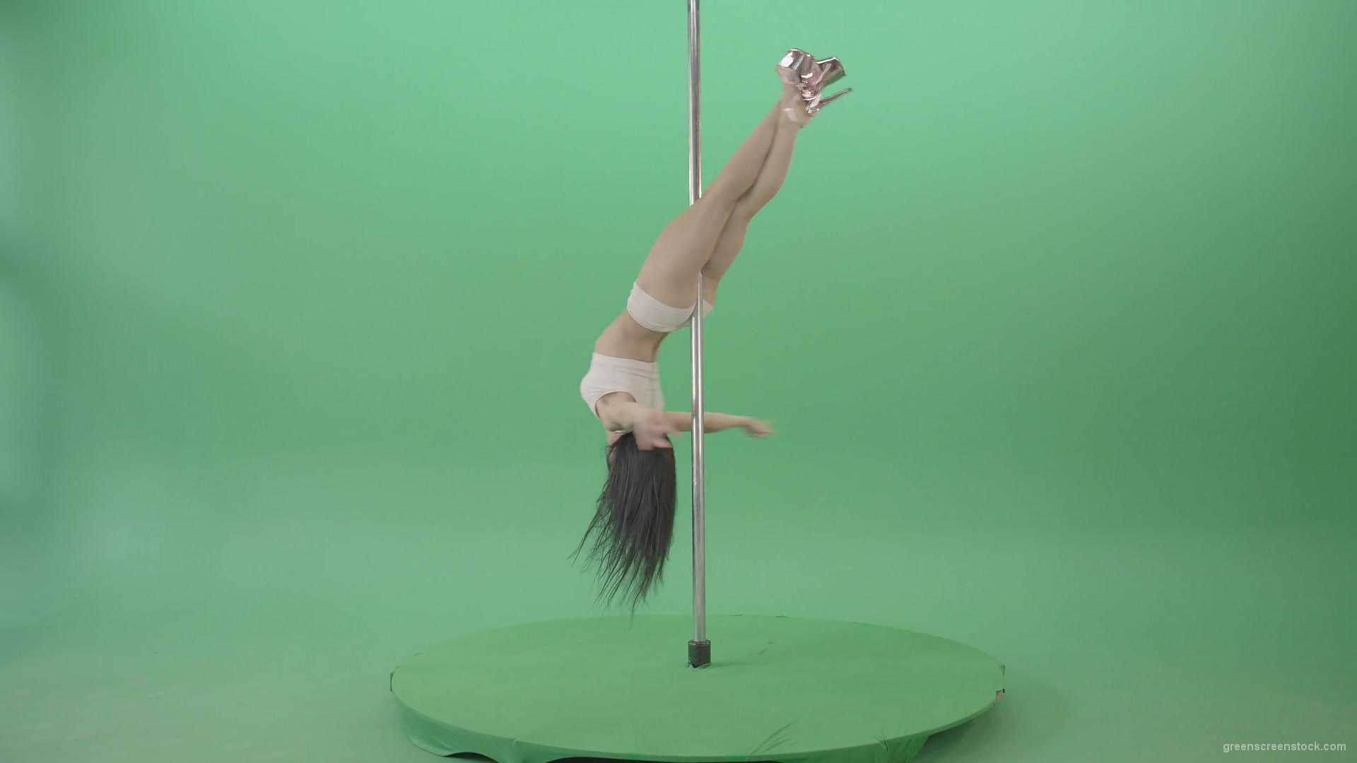 White-dressed-Girl-spinning-down-head-on-pole-dance-on-green-screen-4K-Video-Footage-1920_006 Green Screen Stock