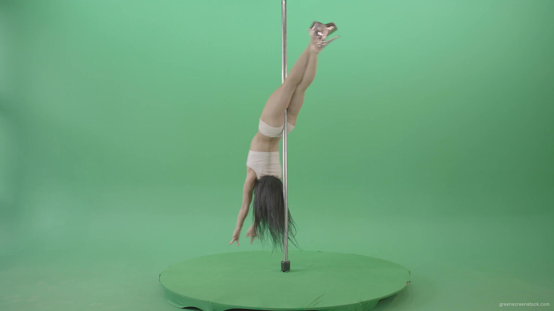 White-dressed-Girl-spinning-down-head-on-pole-dance-on-green-screen-4K-Video-Footage-1920_008 Green Screen Stock