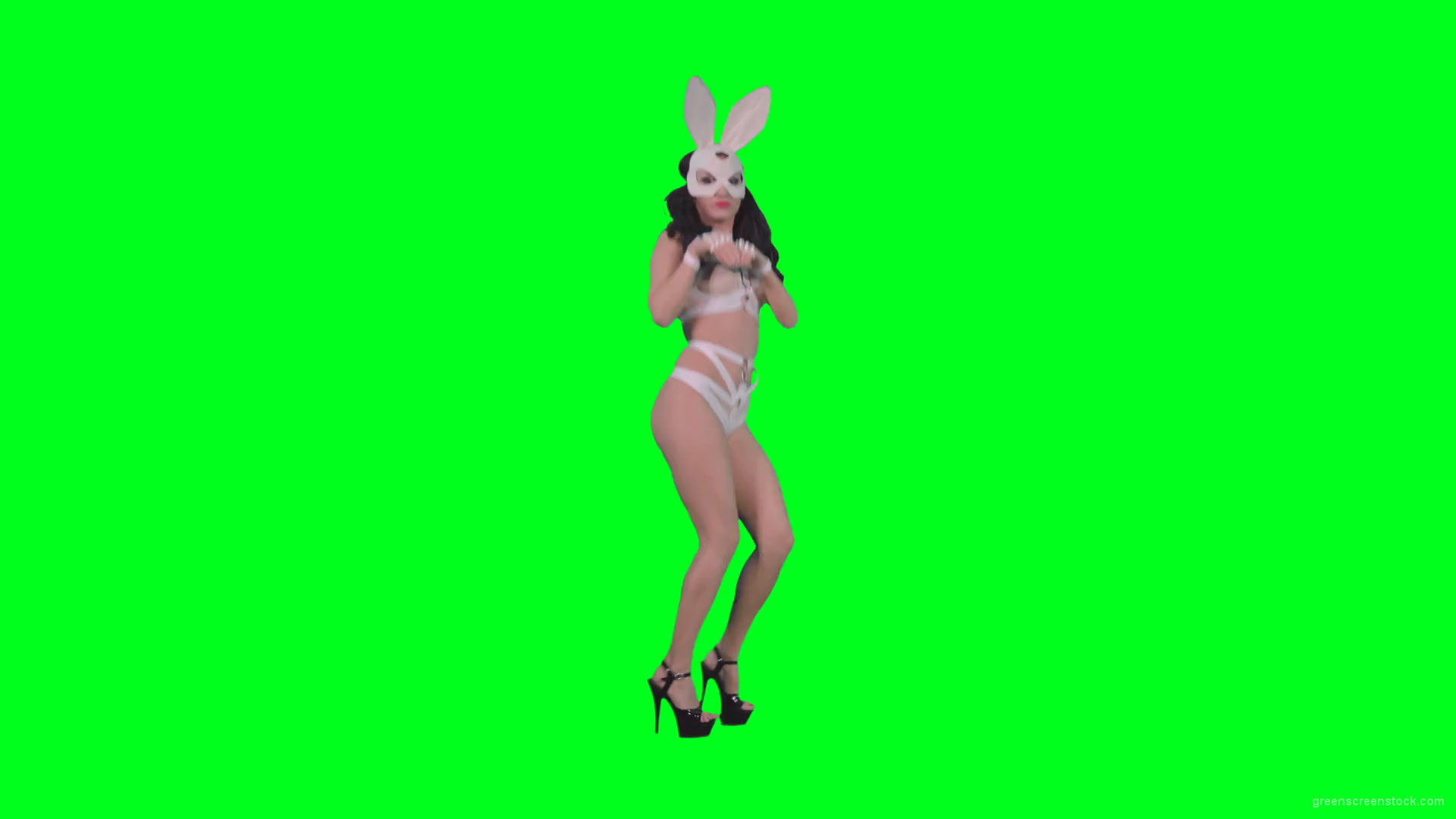 Young-girl-in-rabbit-costume-jumping-and-spinning-on-green-screen-4K-Video-Footage-1920_001 Green Screen Stock