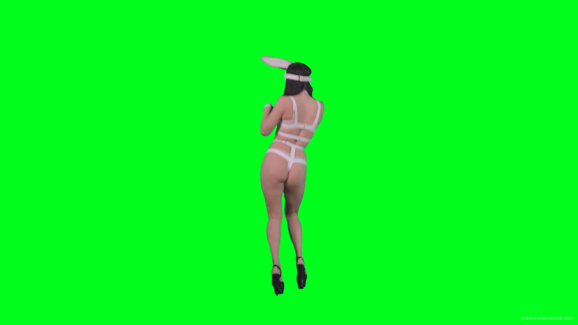 Young-girl-in-rabbit-costume-jumping-and-spinning-on-green-screen-4K-Video-Footage-1920_002 Green Screen Stock