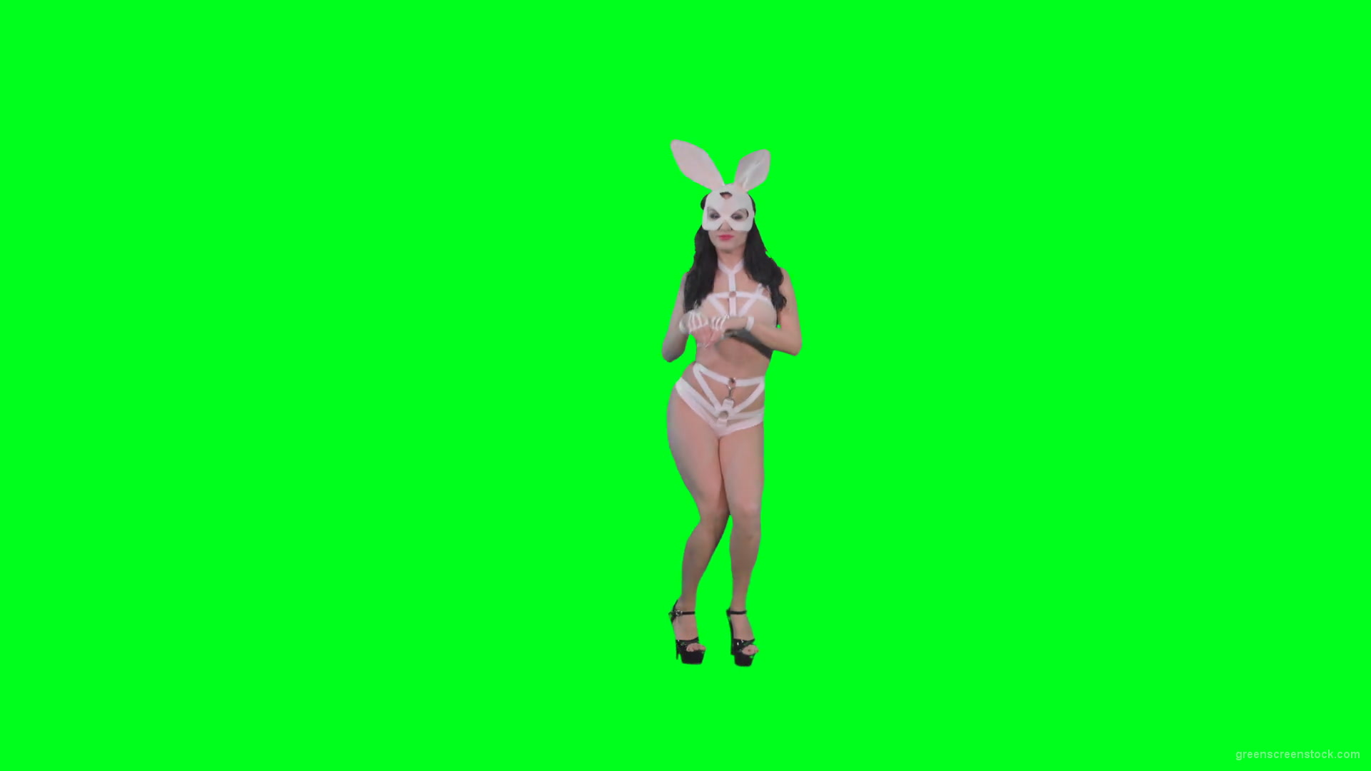 Young-girl-in-rabbit-costume-jumping-and-spinning-on-green-screen-4K-Video-Footage-1920_008 Green Screen Stock