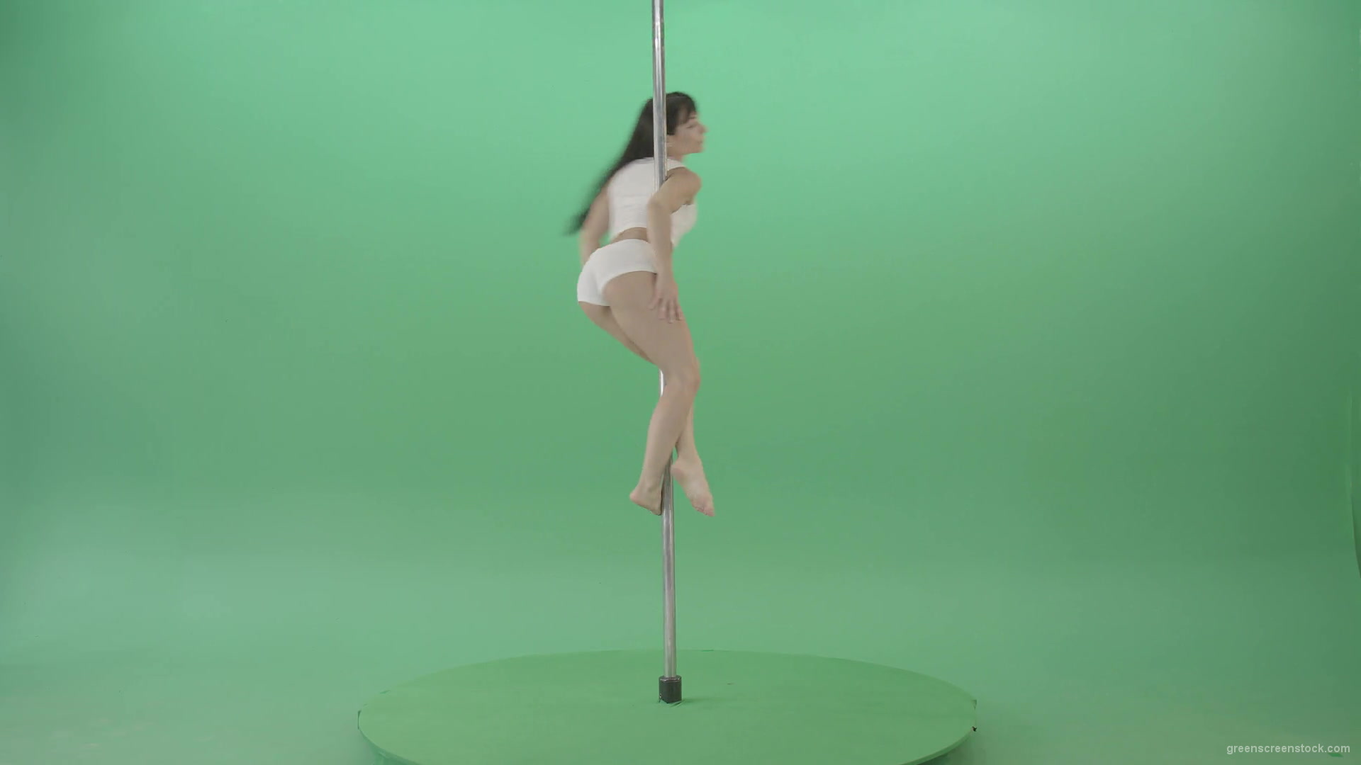 Young-woman-spinning-in-pole-dance-on-green-screen-1920_006 Green Screen Stock