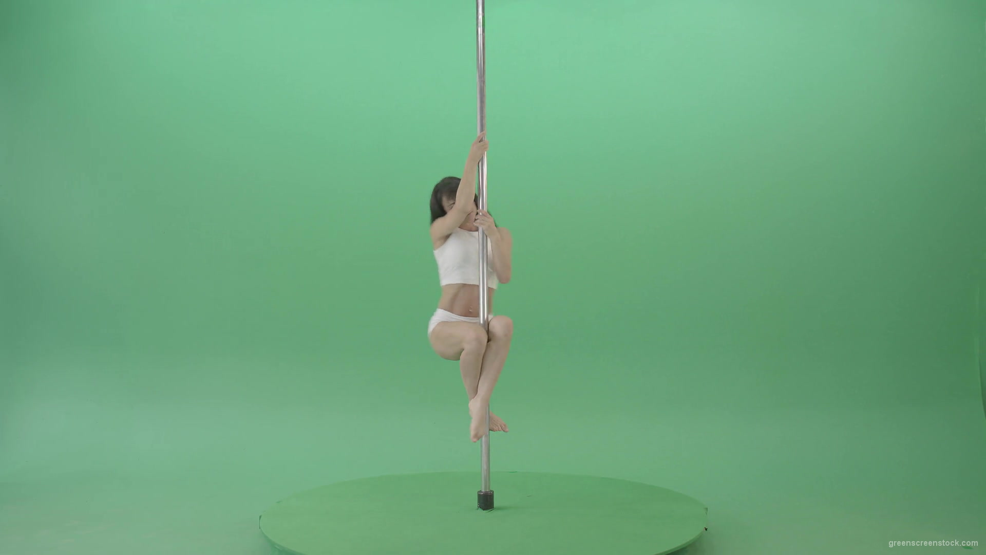 Young-woman-spinning-in-pole-dance-on-green-screen-1920_008 Green Screen Stock